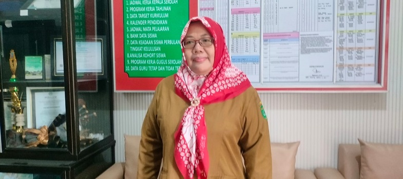 Bagian Kesiswaan SD Negeri 028 Tenggarong, Siti Khoiriyah.