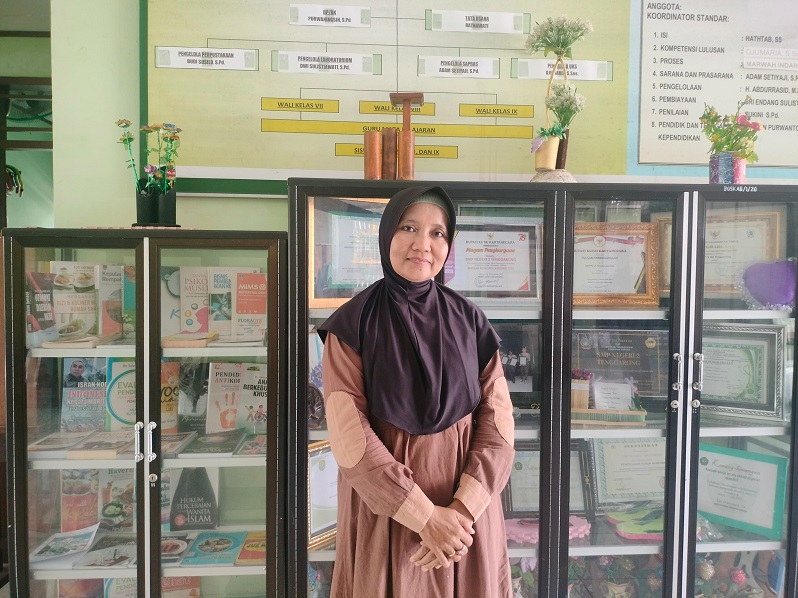 Wakil Kepala Bidang Kurikulum SMP Negeri 2 Tenggarong, Nor ‘Afni Herniwati, S.Pd